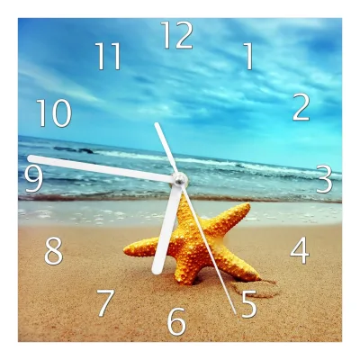 Wallario Uhr 30 x 30 cm, schwarze Zeiger Seestern am Strand am Meer
