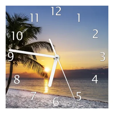 Wallario Uhr 30 x 30 cm, weiße Zeiger Palme am Strand - Sonnenuntergang über dem Meer